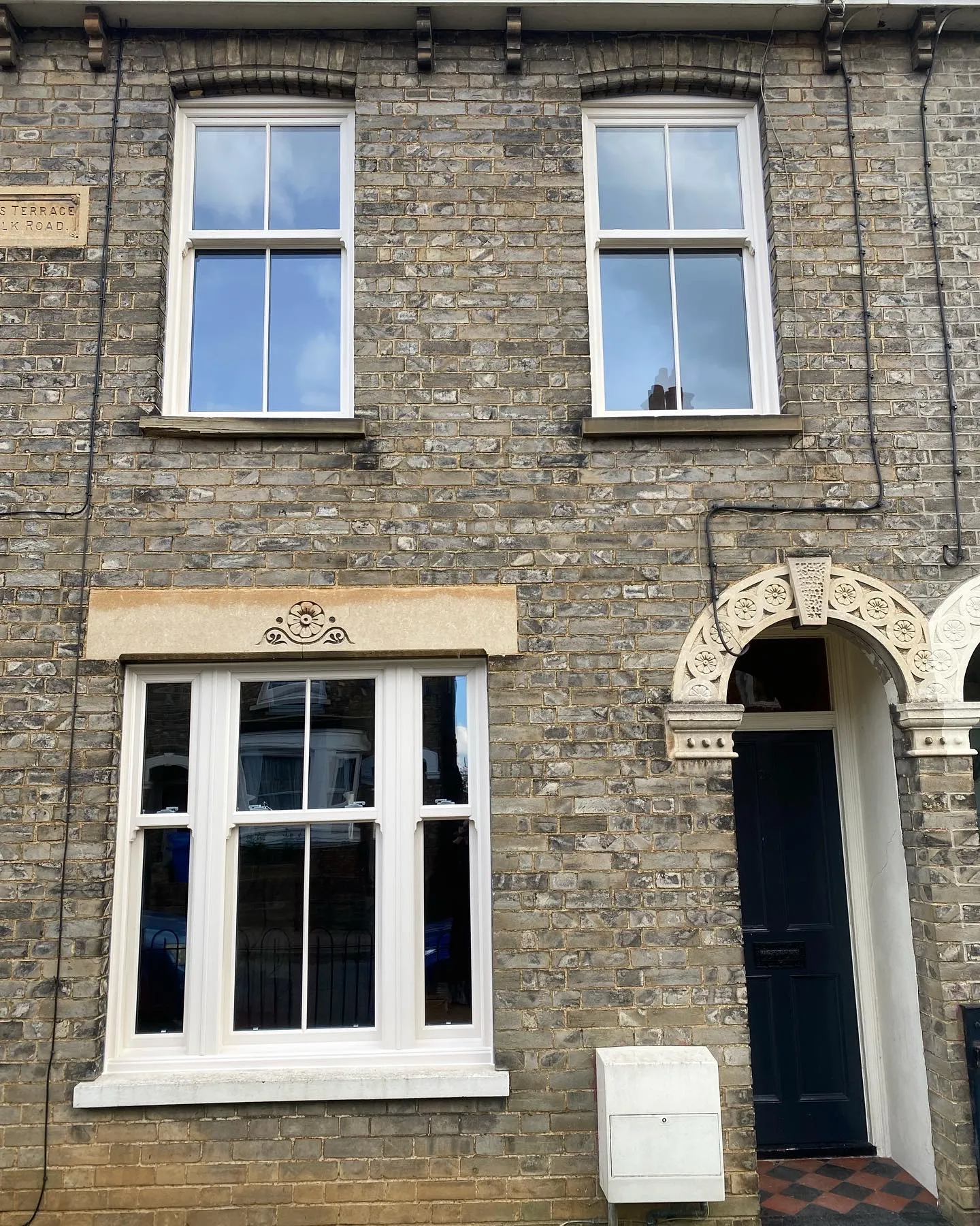 White ECOSlide sash windows in a bay arrangement
