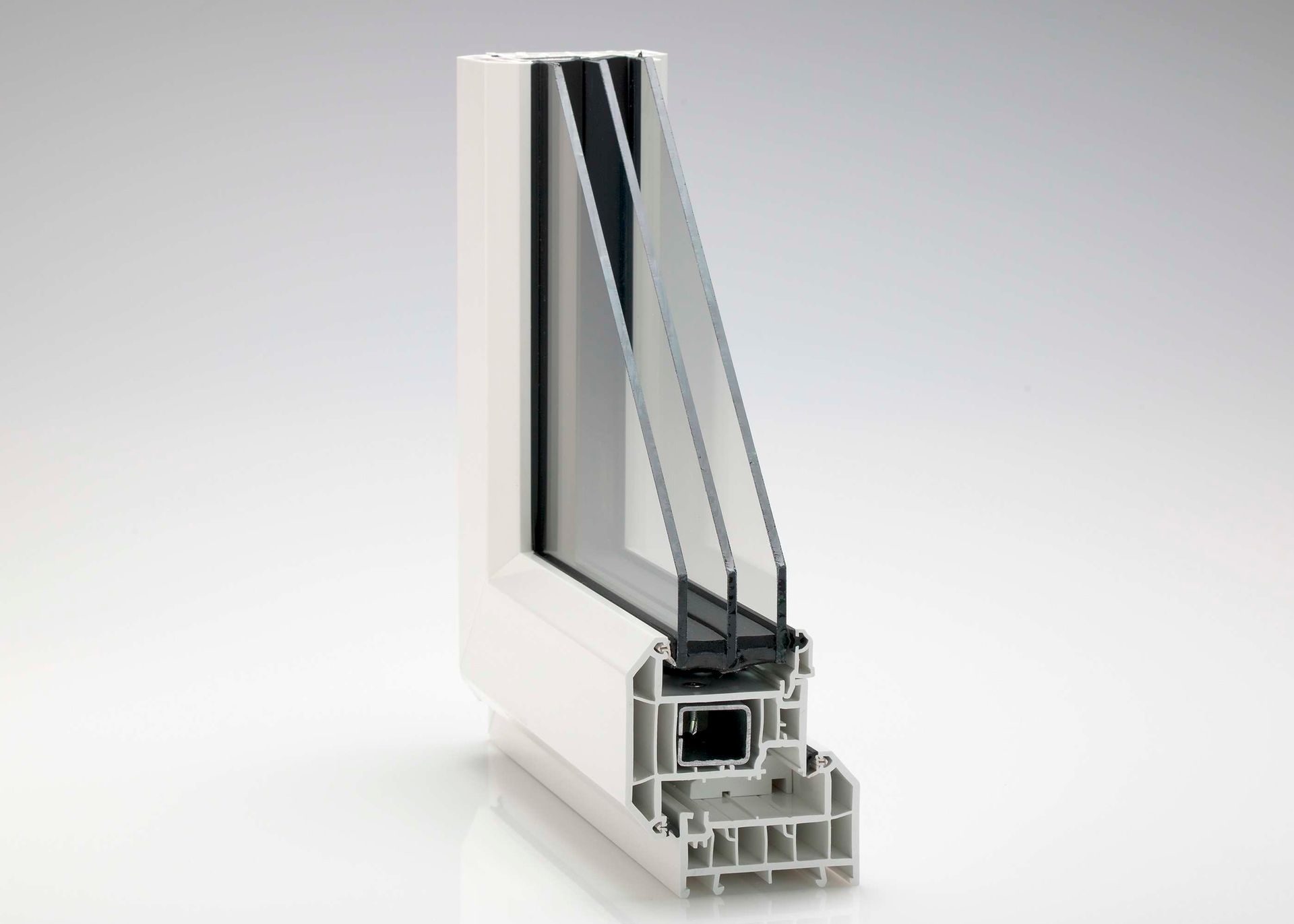 REHAU TOTAL70 cutaway showing the internal profile chambers, reinforcement and glazing