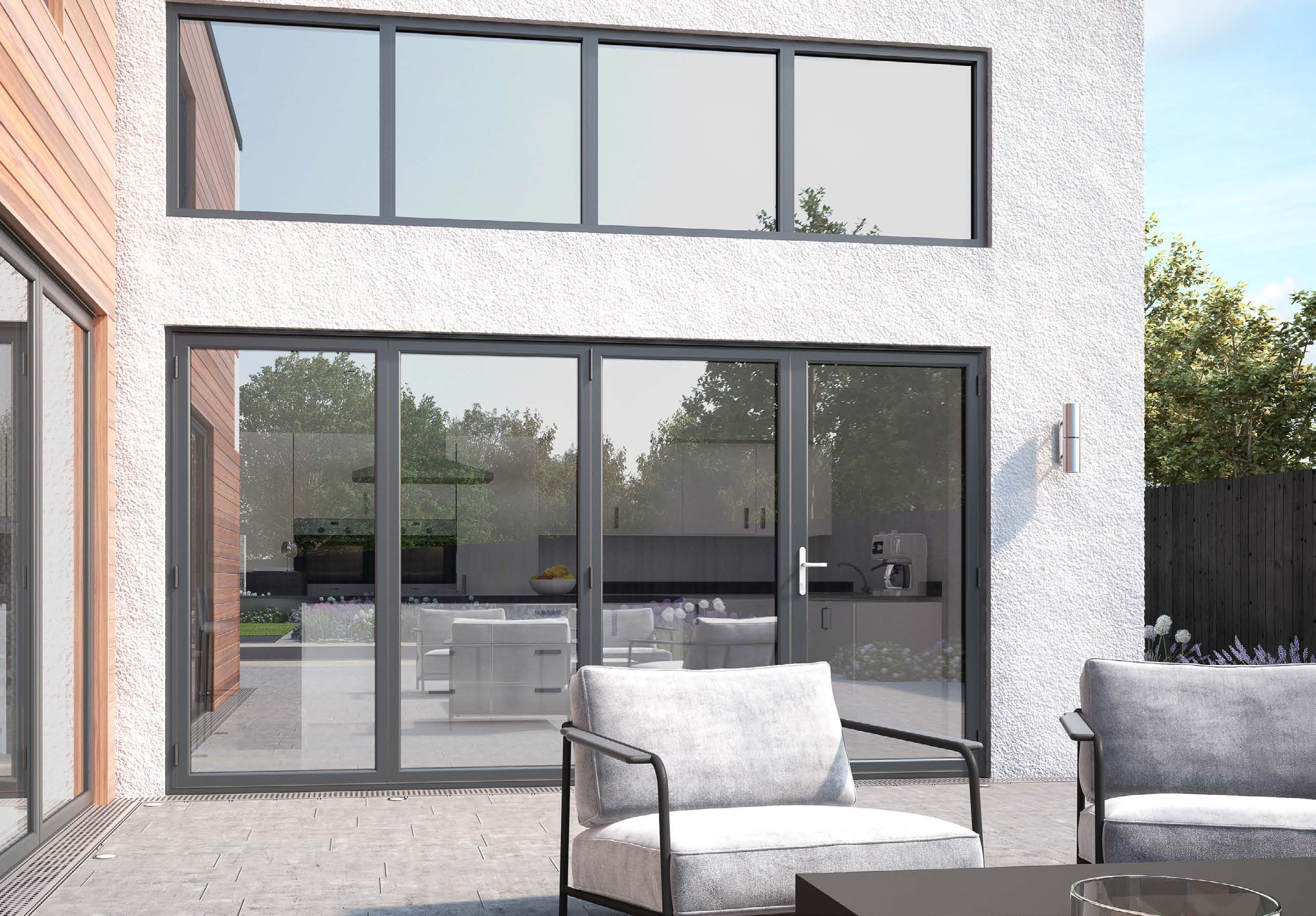 Contemporary grey aluminium glazing on a white-rendered home, from Senior’s window collection